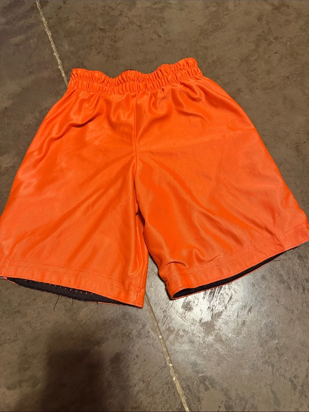 Kids Black Mesh Athletic Shorts with Orange Trim
